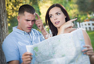 Confused looking people reading a map